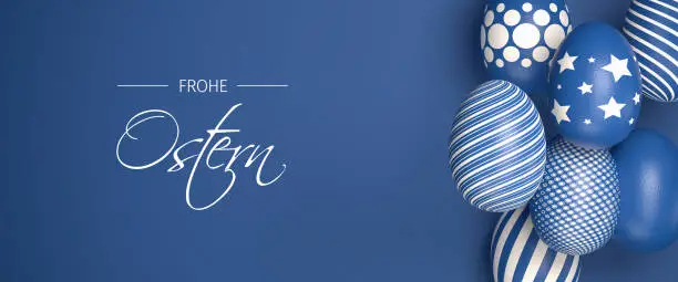 Easter Eggs with different textures in classic blue over a seamless blue background. Text "Happy Easter" in German "Frohe Ostern".