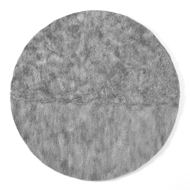 Round gray fluffy carpet on a white background. Top view. 3d illustration
