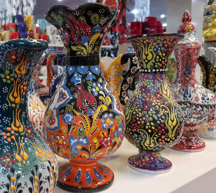 Multicolored painted ceramic oriental vases - a beautiful souvenir at the bazaar in Turkey