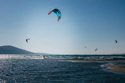 Kiteboarding on the famous Akyaka coast of the Aegean Sea. stock photo