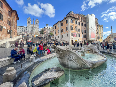 Italy, Fountain of the Boat known as Fontana della Barcaccia in Italian by Spanish Steps in Rome at Piazza di Spagna or Spanish Square in Rome, Italy.