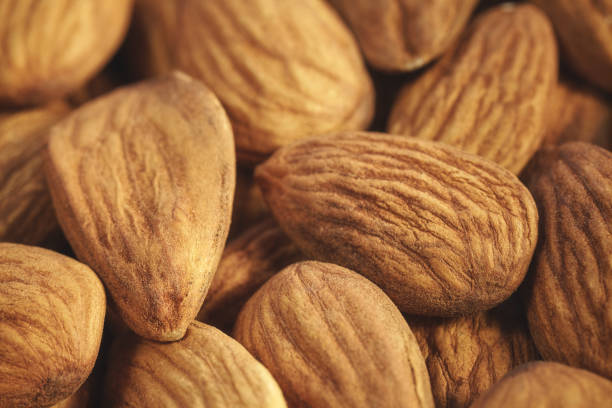 istock Close up picture of almonds, selective focus. 1465086174