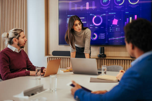istock Manager in meeting with team. 1465094851