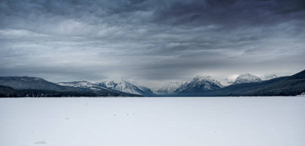 panorama of frozen lake mcdonald in glacier national park, montana - montana mountain mcdonald lake us glacier national park imagens e fotografias de stock