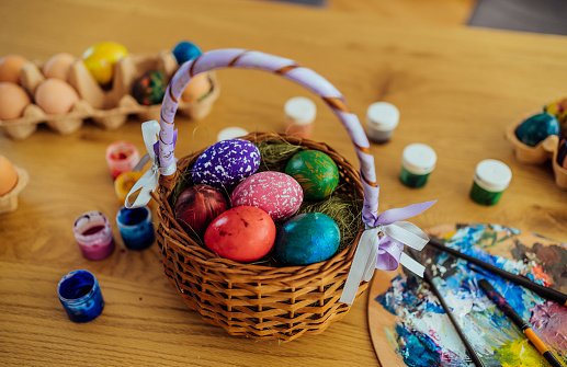 Freshly colored Easter eggs in a basket