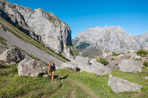 Woman hiking in Picos de Europa, Spain