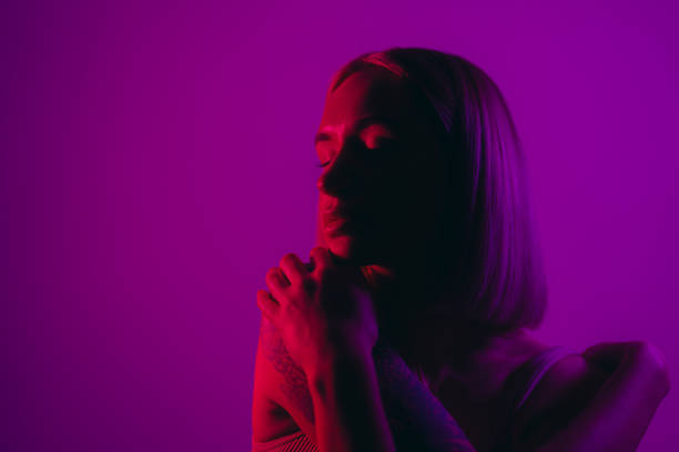 istock Woman dreaming in studio in neon light 1465115819