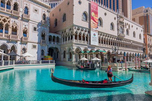 Las Vegas. Nevada, USA. 09.17.2022.Beautiful view of territory of Venetian Hotel in Las Vegas with gondoliers and tourists on gondolas.