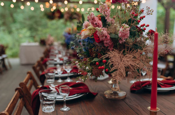 istock Beautiful flowers decorated on the table.Tables set for an event party or wedding reception. 1465127952