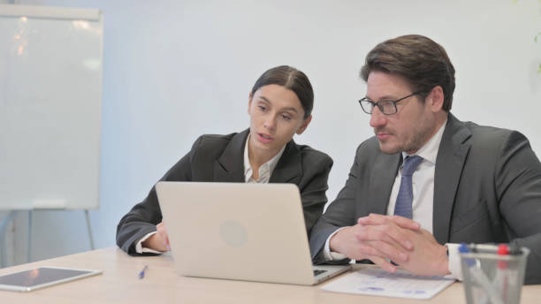 istock Online Video Chat by Business People in Office 1465133043
