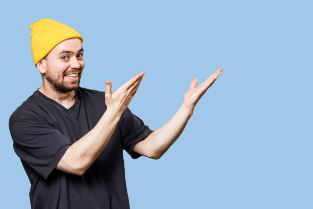 istock Excited and Glad Guy's Happy Expression in Studio Portrait with Copy Space 1465145485