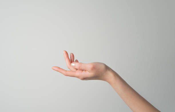 istock Female open hand clean simple modern background for skincare, presentation, mockup 1465149781