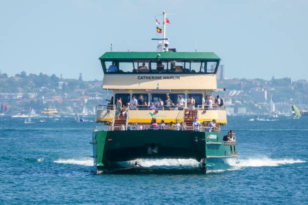 Manly, Australia-December 19TH 2013: The Manly Fast Ferry leaving Manly harbour for Circular Quay. The fast ferry competes the journey in 15 minutes.