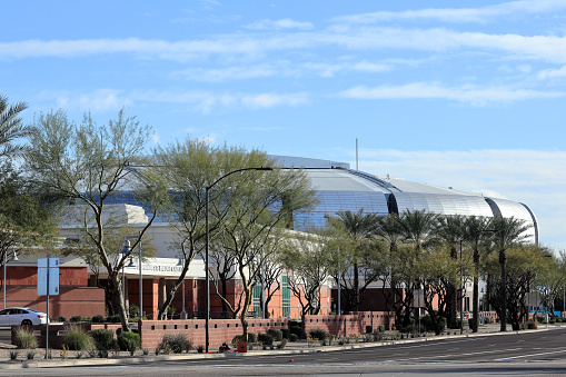 Glendale, AZ - January 31, 2023:  Cardinal's State Farm Stadium, host of  Super Bowl LVII, as seen from the crossroad of West Coyotes Blvd and North 95th Avenue in Glendale, Arizona