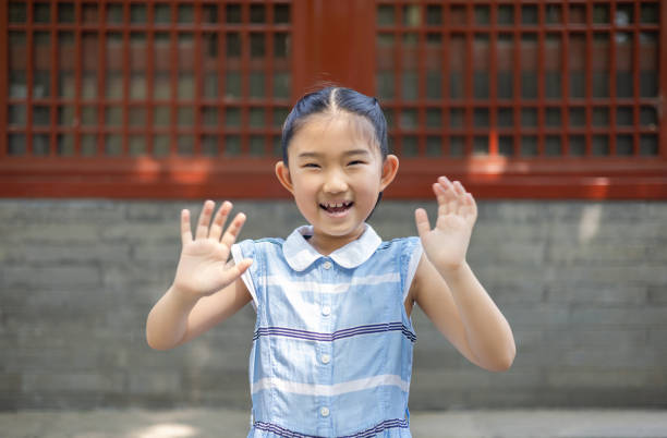 Little girl waved hello