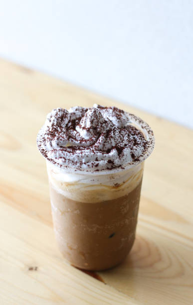 istock Dalgona coffee with float and cocoa powder topping. 1465169158