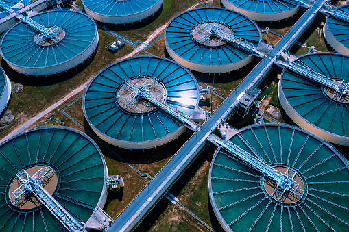 Aerial View of Drinking water treatment plant. Microbiology of drinking water production and distribution, water treatment plant. Microbiology of drinking water production. Morning scene.