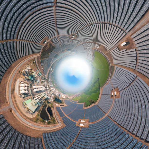 istock Solar power station panels during the Morning, and reflection on the panels for producing alternative energy 1465178376