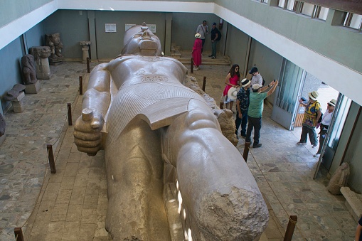 Memphis,Egypt: November 19,2022- Lying down colossal statue of Rameses II in Memphis museum