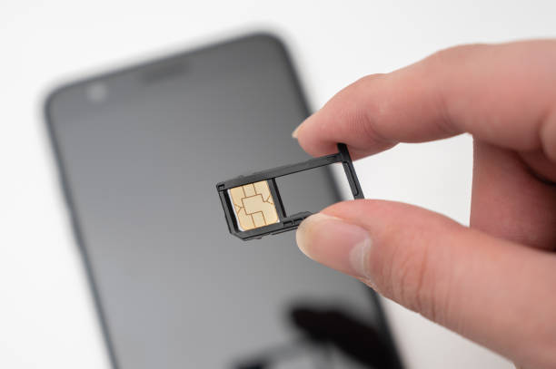 istock sim card and mobile phone 1465185157