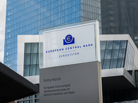 Frankfurt, European Central Bank entrance sign of the entry north. Monetary policy institution for the Eurosystem. The ECB tower building is in the background.