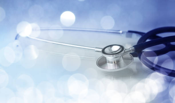 istock Medical stethoscope on bright abstract background 1465191909