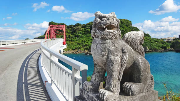 istock Okinawa Sea and Shisa blue sky Ikei Bridge 1465195267
