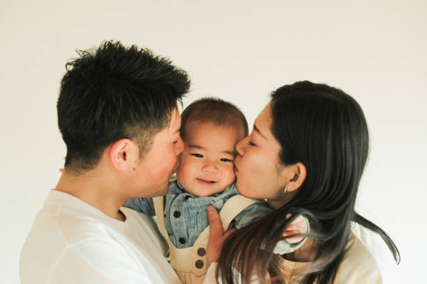 Portrait Of Happy Asian Family stock photo