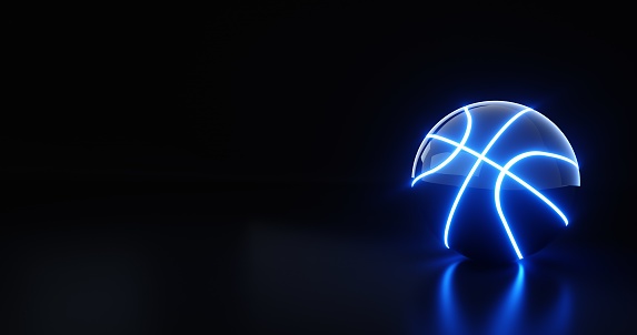 Black Basketball Ball With Blue Neon Lights On Empty Space Black Background. Sport Content.