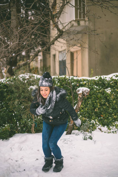 istock young woman enjoys cold winter day 1465199125