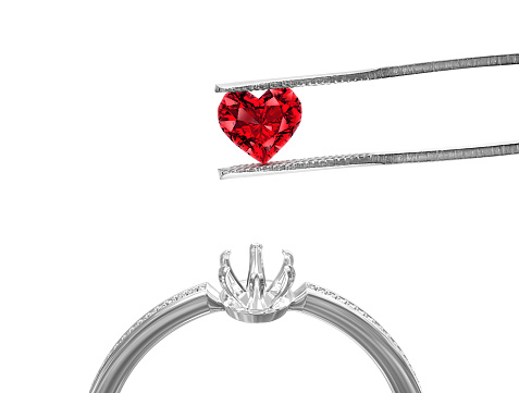 White gold or silver ring without gemstone and Excellent red heart cut diamonds held by tweezers on a white background. 3d render
