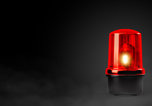 Red siren emergency warning light with black base that are currently on with black background with smoke 3d render illustration with clipping path