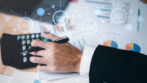 istock Business people read business statistics chart reports, to analyze and improve corporate strategy, manage financial and marketing documents, update annual budget accounts, company growth data. 1465211979