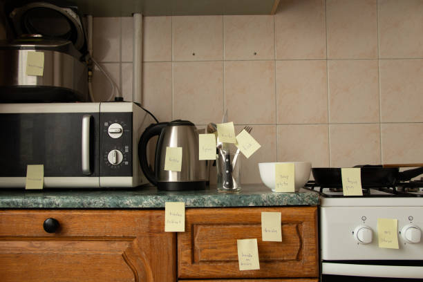 istock Learning English using cards hung in the kitchen in the apartment, learning a foreign language at home 1465214367