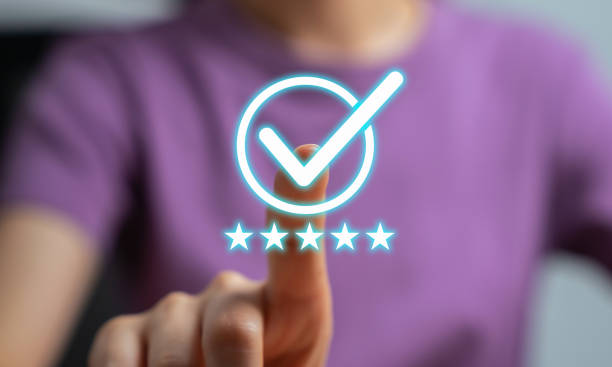 istock Woman hand choose options check mark with best quality control certification assurance guarantee. 1465218716