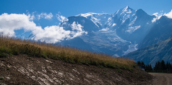 A landscape of rocks in the Le Prarion mountains on a sunny day in Les Houches, France