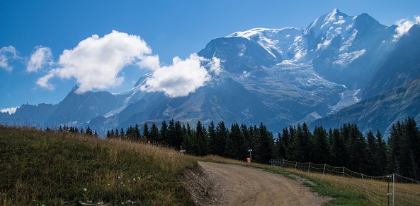 A landscape of rocks in the Le Prarion mountains on a sunny day in Les Houches, France