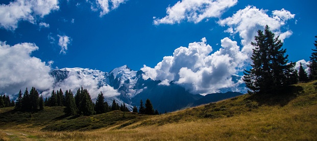 A landscape of rocks in the Le Prarion mountains on a sunny day in Les Houches, France