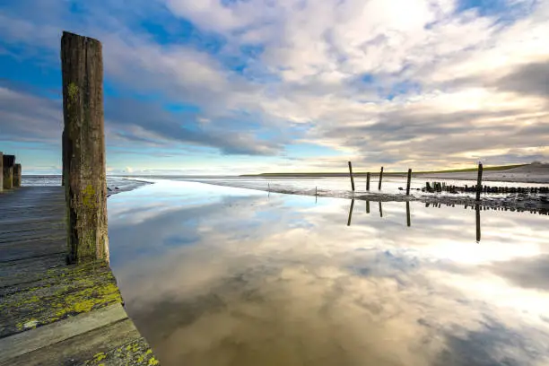 A mesmerizing view from an old forgotten harbor near the village of Cocksdorp, Texel, Wadden Sea