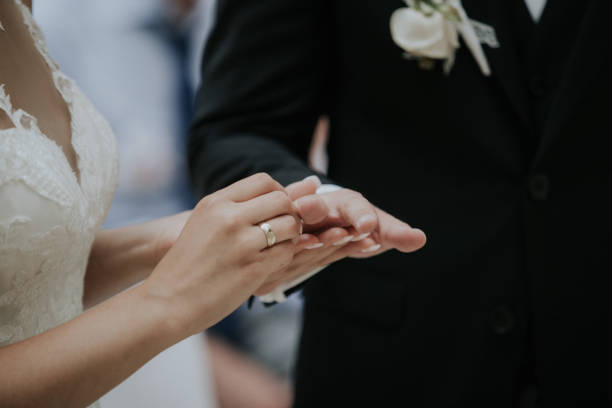 istock Unrecognizable couple exchanging rings during the wedding ceremony 1465224760