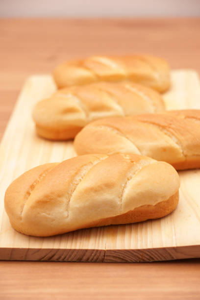 istock Milk bread on a wooden board 1465227736
