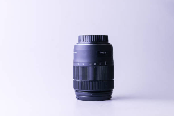istock Closeup shot of an objective lens for a camera on the white background 1465231088