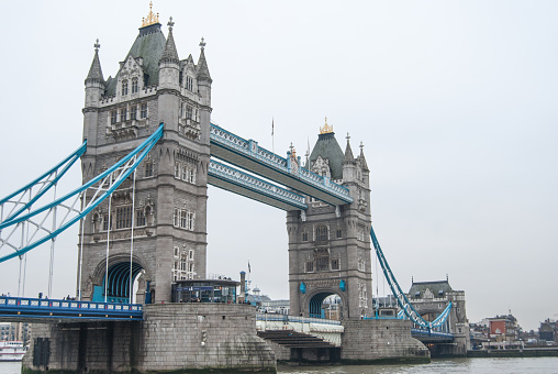 An iconic Tower Bridge on the Thames River in London, UK