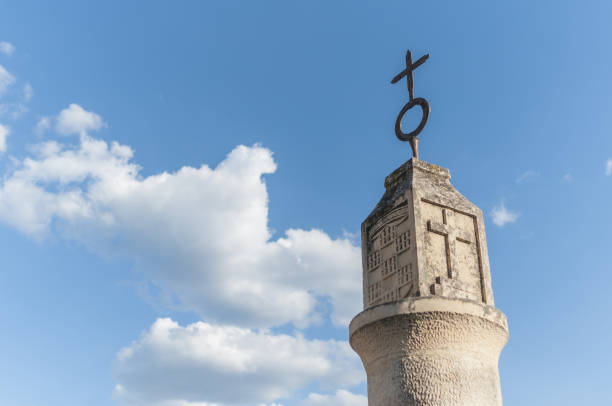 istock Christian cross on a building in Castilla, Spain 1465236054