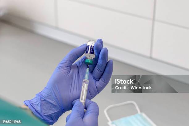 Selective Focus Image Of Doctor Holding Syringe And Vaccine Vial Covid Coronavirus Vaccination Stock Photo - Download Image Now
