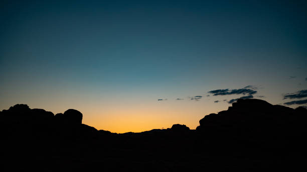 istock Silhouette of hills during sunrise 1465242044