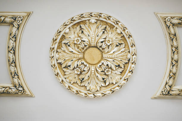 istock Plaster ornamental decoration on a white wall 1465243454