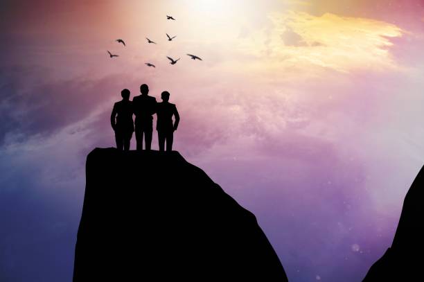istock Teamwork, target and success concept, silhouette people standing and looking forward to business target in future 1465245080