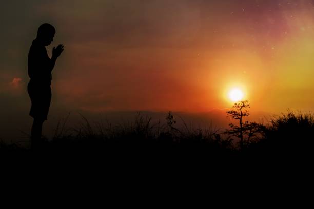 silhouette people praying and hope with sun shine