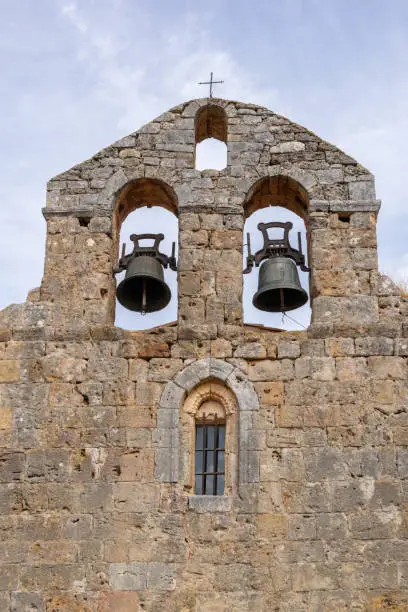 A vertical shot of the bells of thechurch of Quintanarruz. Burgos, Castilla y Leon, Spain